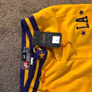 Retro LA lakers warm up pants .